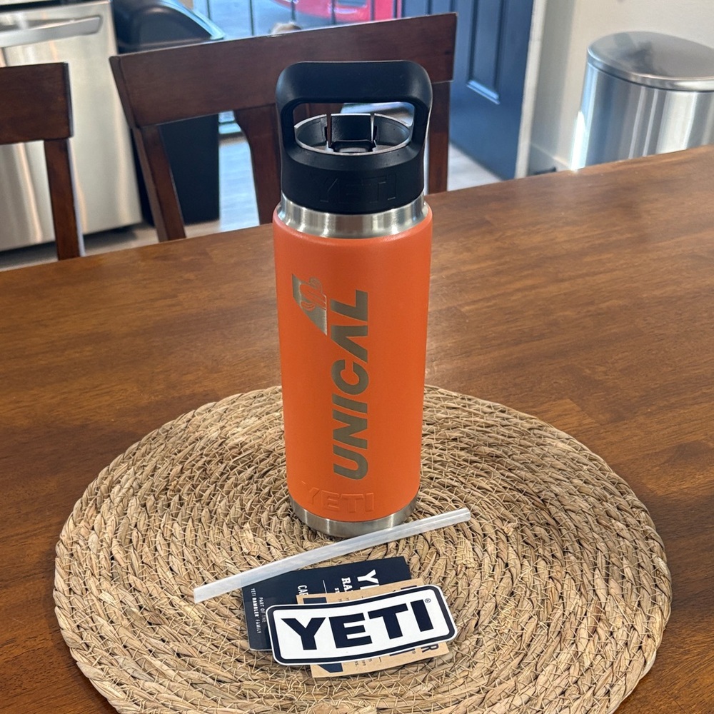 Yeti Rambler Bottle in Bright Orange with Black Lid